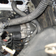 Here’s an image from bimmerfest forums with the intake removed. Note that the top mounting bolt is not pictured and behind that flexible conduit.
